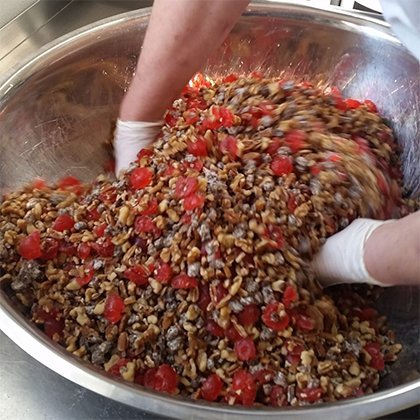 Nuts and Fruit Mixed by Hand for Gourmet Fruitcake
