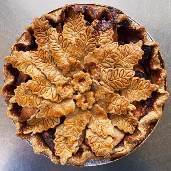 salted caramel apple pie with decorative top crust